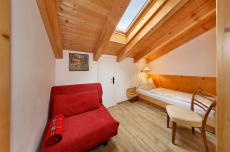 Ferienwohnung Marling − Zimmer mit Einzelbett und Schlafsofa