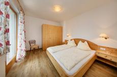 Ferienwohnung Meran − Schlafzimmer