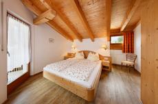 Ferienwohnung Tirol − Schlafzimmer